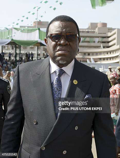 Namibian President Hage Geingob arrives to attend the inauguration of Nigerian President Mohammadu Buhari at the Eagles Square in Abuja, on May 29,...