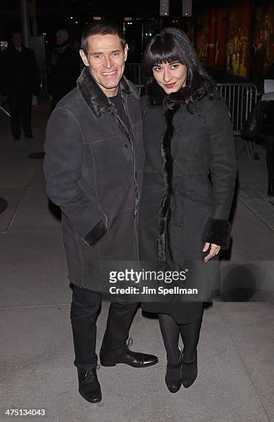 Actor Willem Dafoe and director Giada Colagrande attend the "The Grand Budapest Hotel" New York Premiere at Alice Tully Hall on February 26, 2014 in...