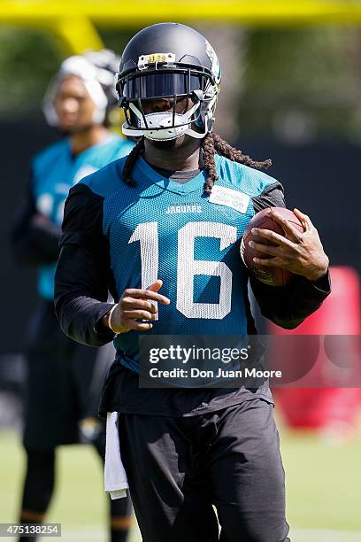 Runningback Denard Robinson of the Jacksonville Jaguars works out during OTA's at Everbank Field Stadium at the Florida Blue Health and Wellness...