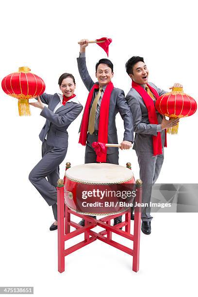 cheerful business colleagues celebrating chinese new year - bedug stock pictures, royalty-free photos & images