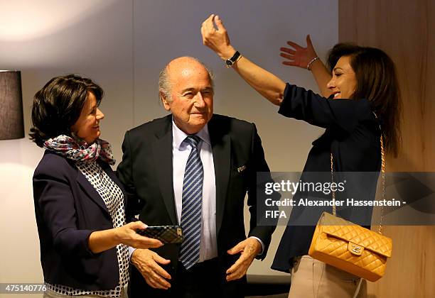 Joseph S. Blatter is congratulated by daughter Corinne and Linda Barras after being re-elected as FIFA President after Presidential candidate H.R.H...