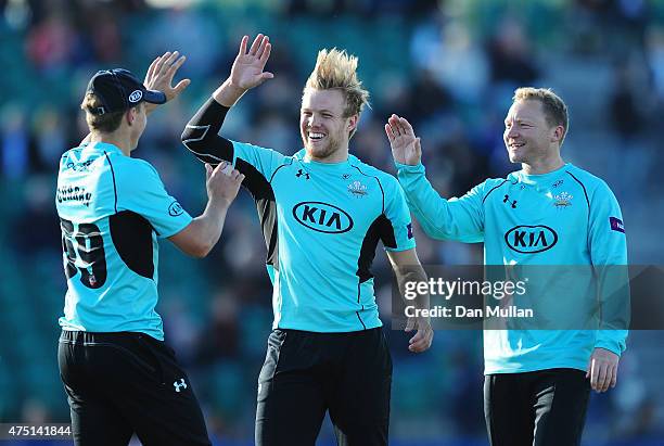 Matt Dunn of Surrey celebrates taking the wicket of Darren Stevens of Kent Spitfires during the NatWest T20 Blast match between Kent and Surrey at...