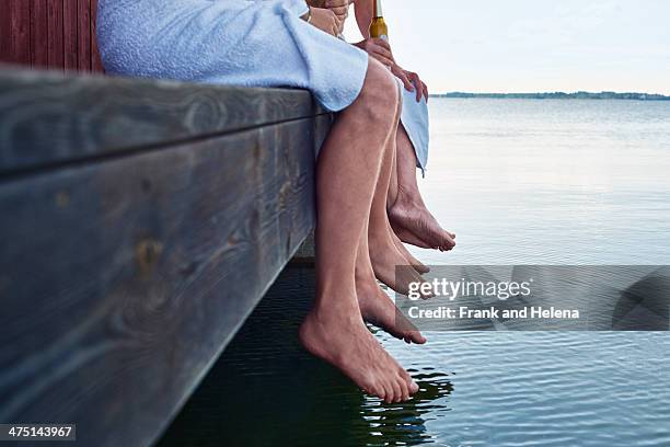 close up of three males waist down outside sauna - barefoot men 個照片及圖片檔