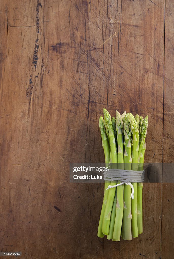 Bunch of asparagus tied with string, still life