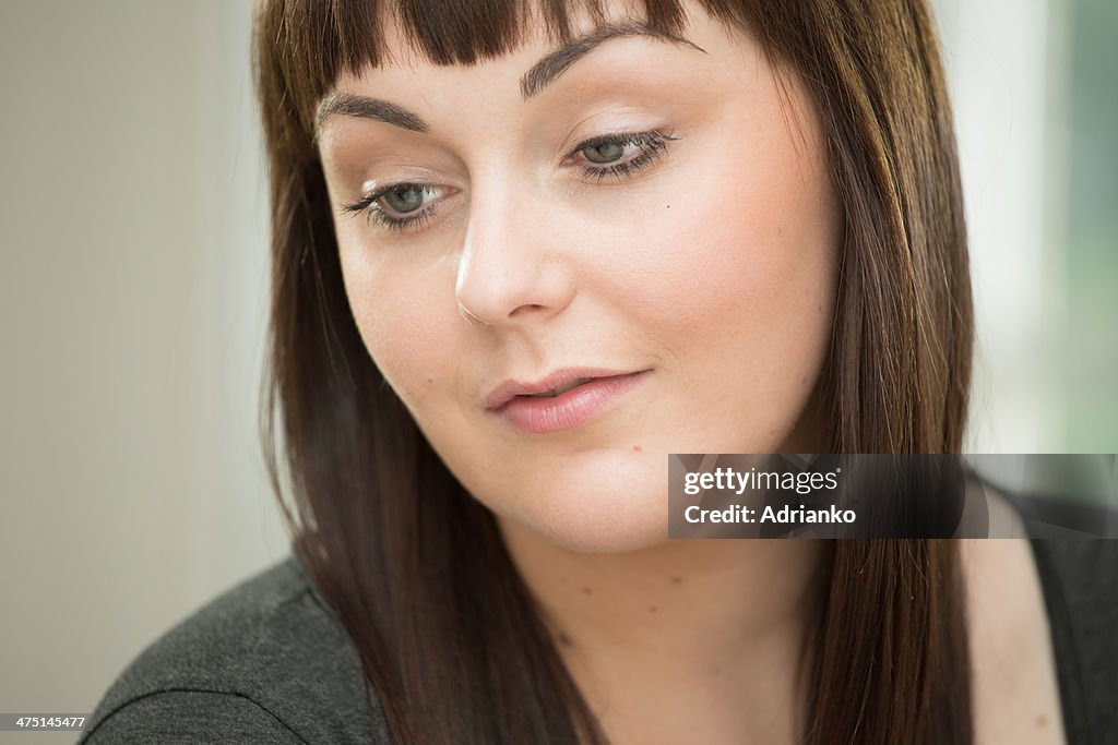 Young woman looking down