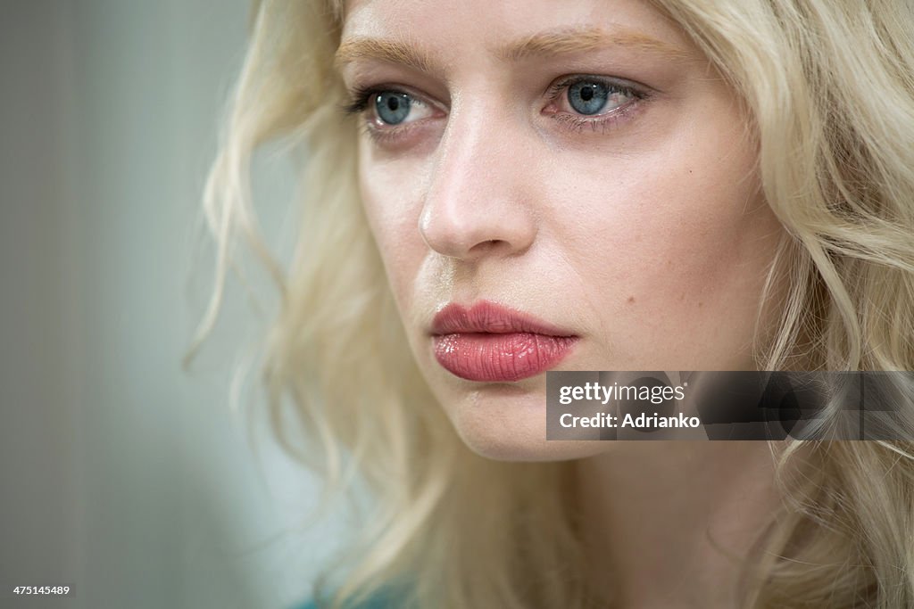 Young woman looking sad
