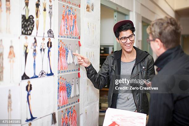 fashion design teacher and student in discussion - fashion student stock pictures, royalty-free photos & images