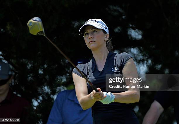 Paige Mackenzie watches her tee shot on the eighth hole during the first round of the ShopRite LPGA Classic presented by Acer on the Bay Course at...