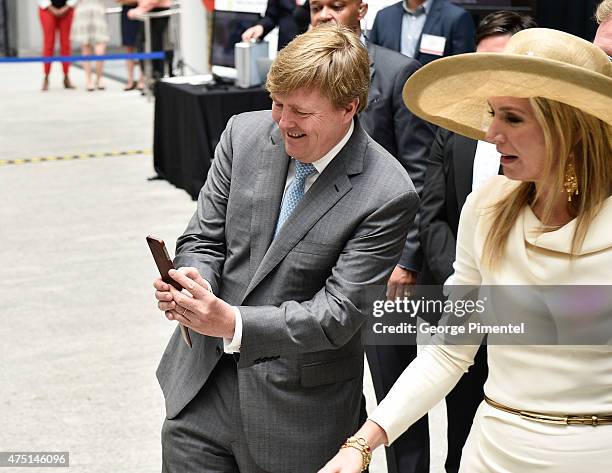 King Willem-Alexander and Queen Maxima of The Netherlands visit MaRS Discovery District during state visit to Canada on May 29, 2015 in Toronto,...