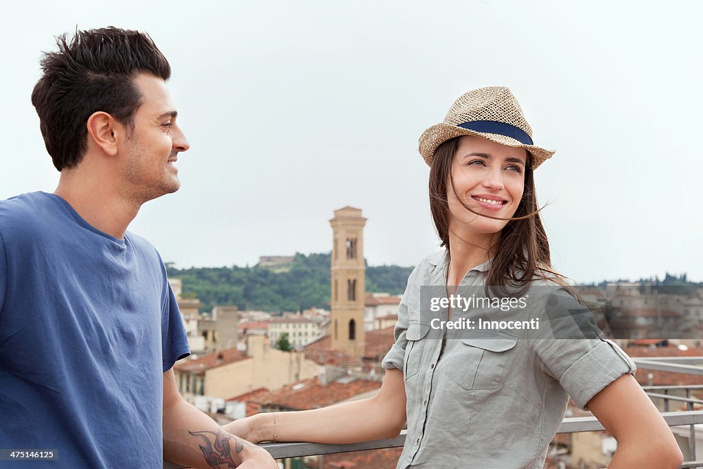 Couple with view of Florence in background, Tuscany, Italy