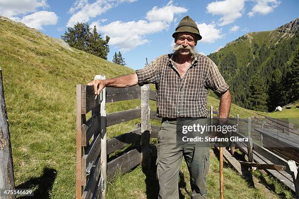 farmer posing for camera - traditional culture stock-fotos und bilder