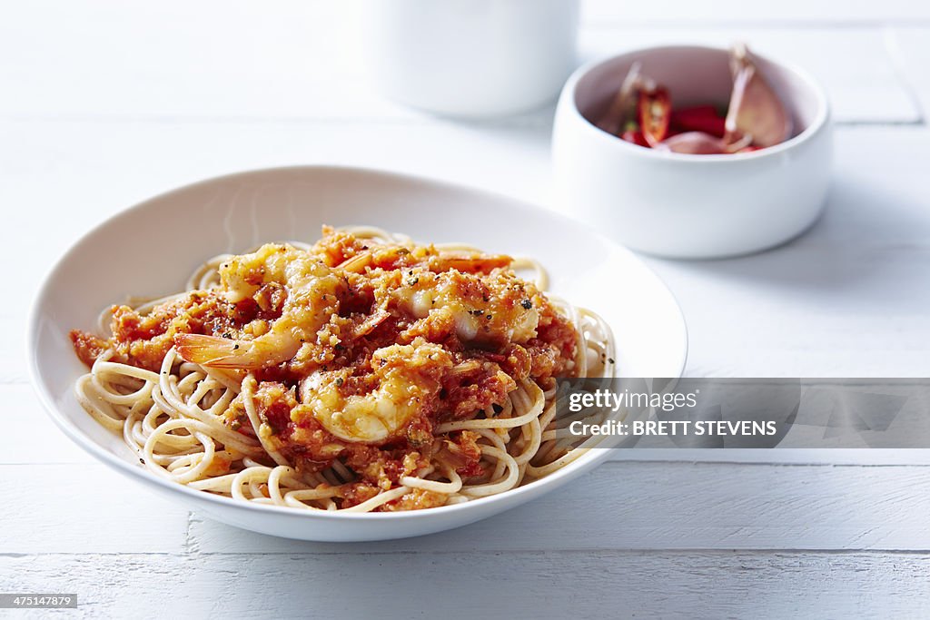Still life of spaghetti with asian prawns