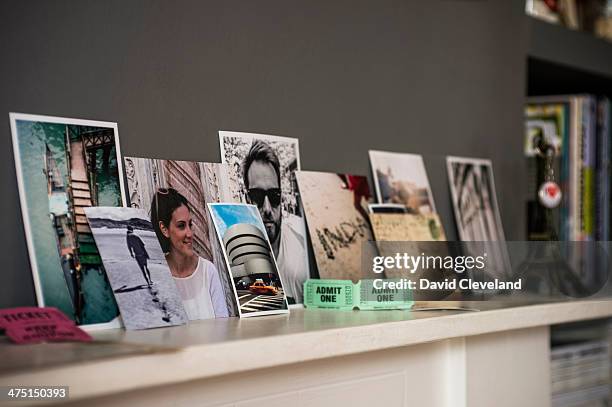 Living room mantelpiece with travel souvenirs and photographs