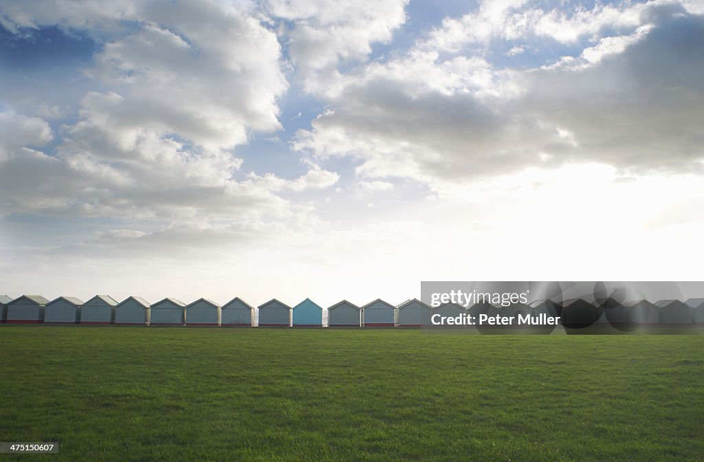 Row of coastal beach huts, Sussex, United Kingdom