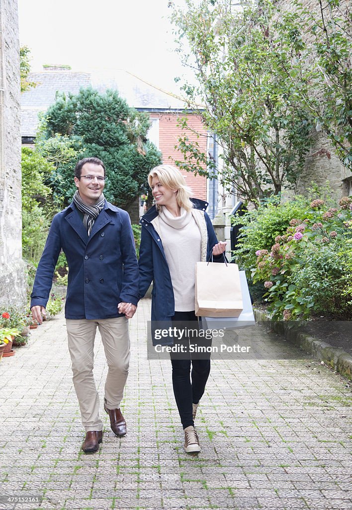 Mid adult couple going shopping