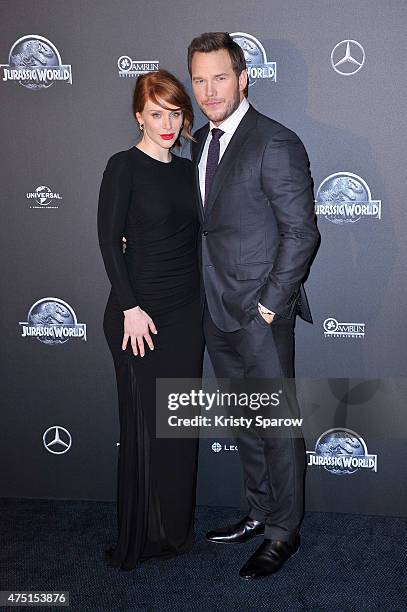 Bryce Dallas Howard and Chris Pratt attend the 'Jurassic World' Photocall at UGC Normandie on May 29, 2015 in Paris, France.