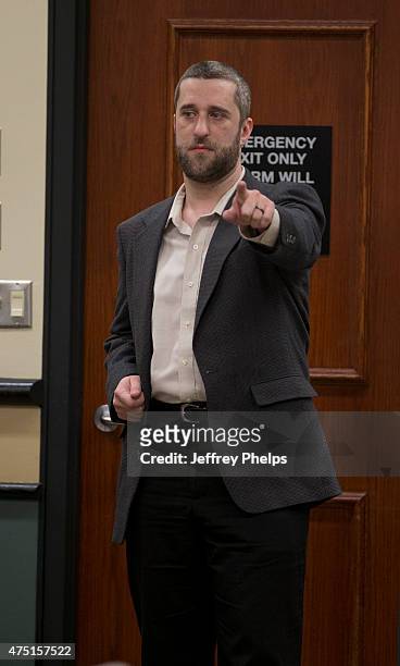 Dustin Diamond testifies how he held a knife to his side in the courtroom during his trial in the Ozaukee County Courthouse May 29, 2015 in Port...