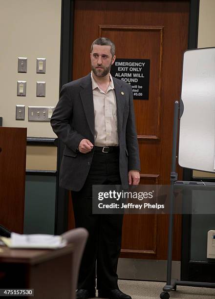 Dustin Diamond testifies how he held a knife to his side in the courtroom during his trial in the Ozaukee County Courthouse May 29, 2015 in Port...