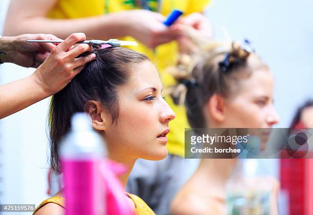 at the hairdresser - show girls stockfoto's en -beelden