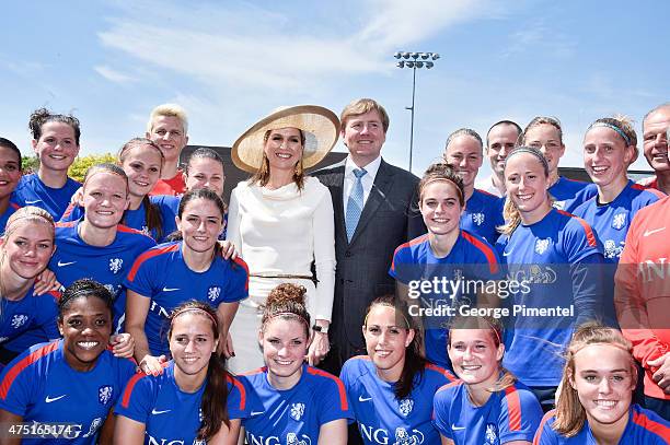 Queen Maxima and King Willem-Alexander of the Netherlands visit the FIFA Dutch Womens National team at Monarch Park Stadium during the state visit to...