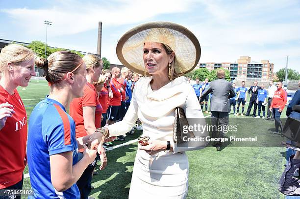 Queen Maxima of the Netherlands visits the FIFA Dutch Womens National team at Monarch Park Stadium during the state visit to Canada on May 29, 2015...