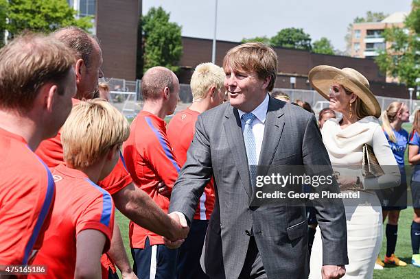King Willem-Alexander and Queen Maxima of the Netherlands visit the FIFA Dutch Womens National team at Monarch Park Stadium during the state visit to...