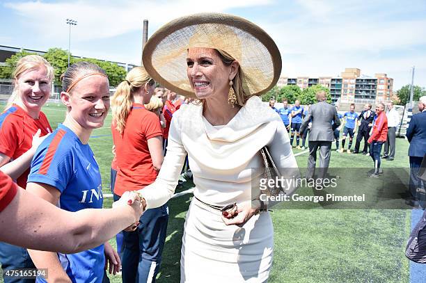 Queen Maxima of the Netherlands visits the FIFA Dutch Womens National team at Monarch Park Stadium during the state visit to Canada on May 29, 2015...