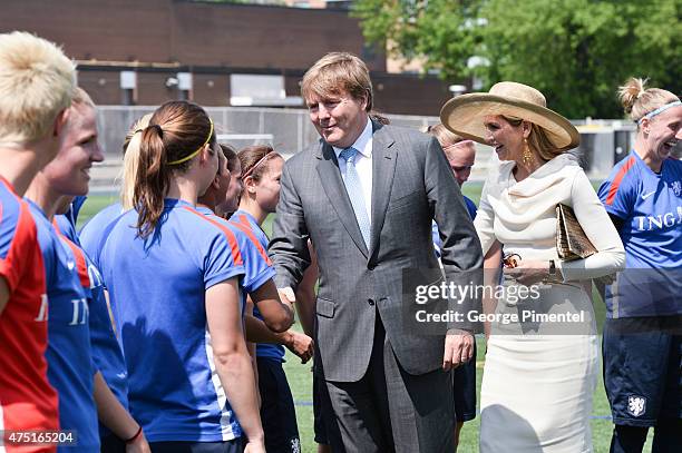 King Willem-Alexander and Queen Maxima of the Netherlands visit the FIFA Dutch Womens National team at Monarch Park Stadium during the state visit to...