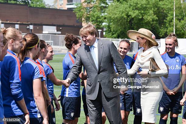 King Willem-Alexander and Queen Maxima of the Netherlands visit the FIFA Dutch Womens National team at Monarch Park Stadium during the state visit to...