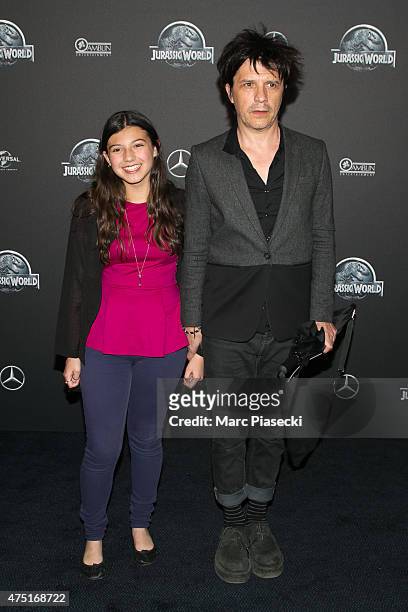 Nicolas Sirkis and daughter Thea Sirkis attend the 'Jurassic World' Premiere at Cinema UGC Normandie on May 29, 2015 in Paris, France.