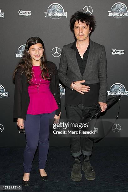 Nicolas Sirkis and daughter Thea Sirkis attend the 'Jurassic World' Premiere at Cinema UGC Normandie on May 29, 2015 in Paris, France.