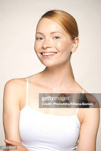 young woman smiling, portrait - キャミソール ストックフォトと画像