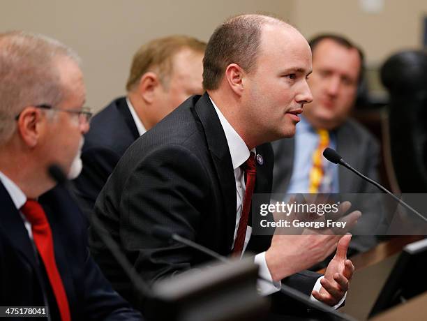 Utah Lt. Governor, Spencer Cox, talk after hearing testimony In a unofficial hearing, before members of the Utah House and Senate along with several...