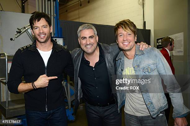 Judge Harry Connick Jr., American Idol's season 5 winner Taylor Hicks, and judge Keith Urban are seen on FOX's "American Idol" Season 13 Top 13...