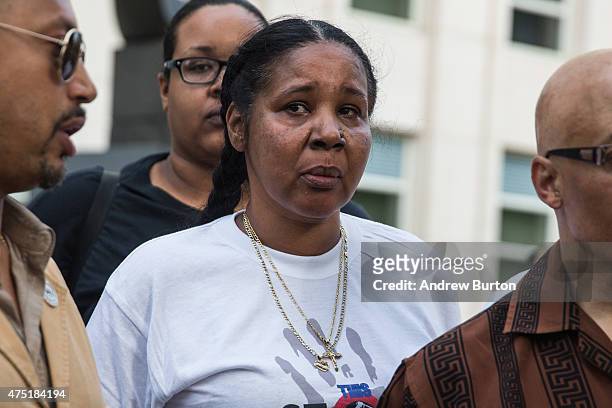 Esaw Garner, wife of Eric Garner, joins protesters demanding further action against the police officers responsible in the death of Eric Garner...