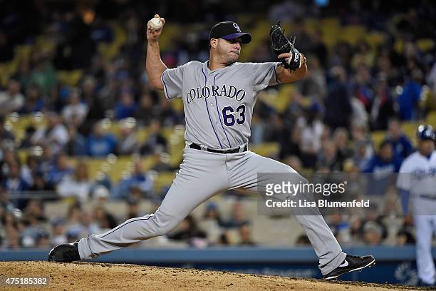 Rafael Betancourt of the Colorado Rockies pitches against the Los Angeles Dodgers at Dodger Stadium on May 16, 2015 in Los Angeles, California.