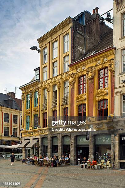 grand place street cafe restaurant in lille france - lille cafe stock pictures, royalty-free photos & images