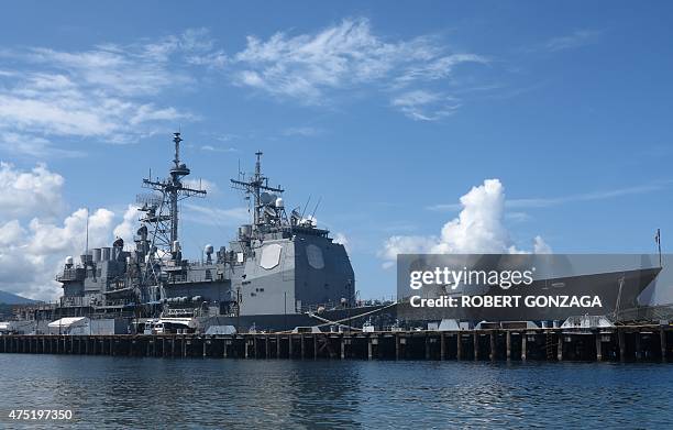The guided missile cruiser USS Shiloh is anchored at Subic Bay, a former US naval base in the Philippines, on May 30 as part of an ongoing US...