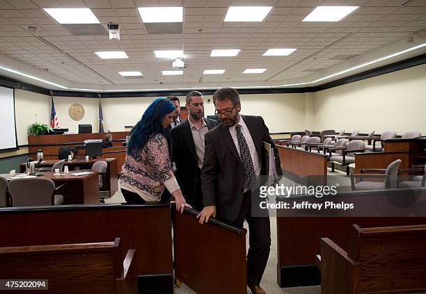 Dustin Diamond, with fiancee Amanda Schutz, and his attorney walk out of the coutroom after a split verdict in an Ozaukee County Courthouse May 29,...