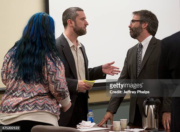 Dustin Diamond, with fiancee Amanda Schutz, and his attorney react after the reading of a split verdict in an Ozaukee County Courthouse May 29, 2015...