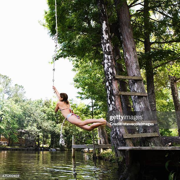 rope swinging - rope swing stock pictures, royalty-free photos & images