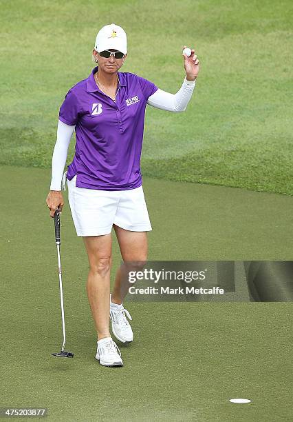 Karrie Webb of Australia acknowledges the crowd after completing her first round in the HSBC Women's Champions at Sentosa Golf Club on February 27,...