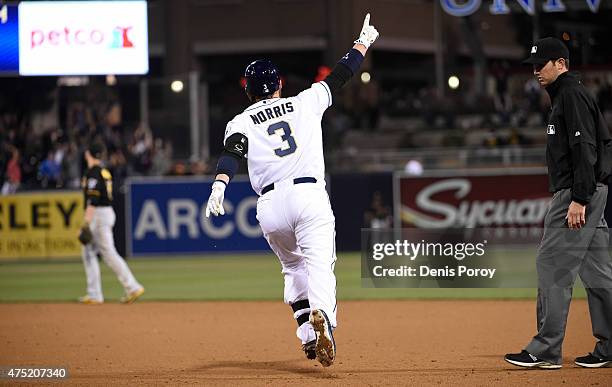 Derek Norris of the San Diego Padres celebrates after hitting a grand slam during the ninth inning of a baseball game against the Pittsburgh Pirates...