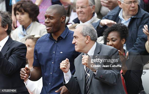 Gregory Bauge and President of French Tennis Federation Jean Gachassin attend day 6 of the French Open 2015 at Roland Garros stadium on May 29, 2015...