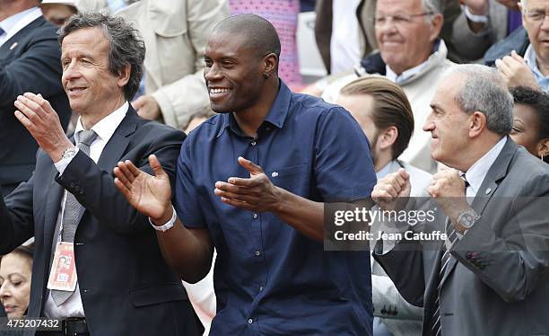 Gregory Bauge and President of French Tennis Federation Jean Gachassin attend day 6 of the French Open 2015 at Roland Garros stadium on May 29, 2015...