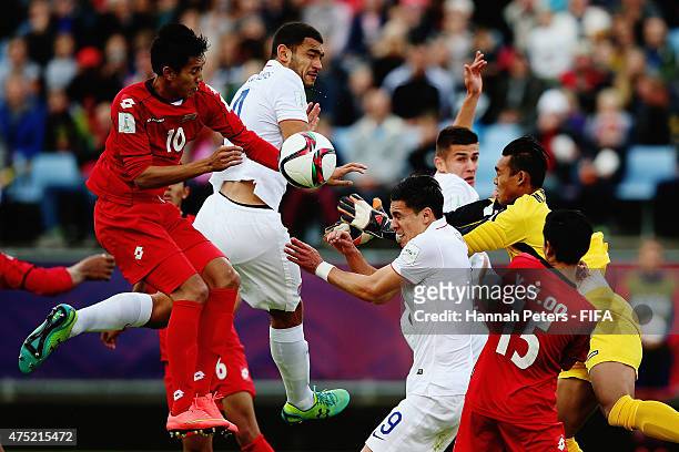 Than Paing of Myanmar defends against Cameron Carter of USA during the FIFA U-20 World Cup Group A match between USA and Myanmar at the Northland...