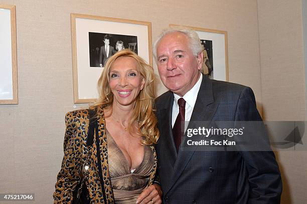 Sylvie Elias Marshall and Robert Rossi attend the 55 portraits of Massimo Gargia Photo Exhibition at Galerie 55 Belchasse on May 29, 2015 in Paris,...