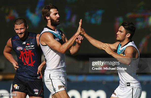 Justin Westhoff of the Power and Chad Wingard celebrate a goal during the round nine AFL match between the Melbourne Demons and the Port Adelaide...