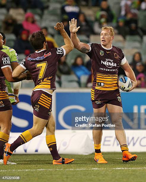 Jack Reed of the Broncos celebrates after scoring a try during the round 12 NRL match between the Canberra Raiders and the Brisbane Broncos at GIO...