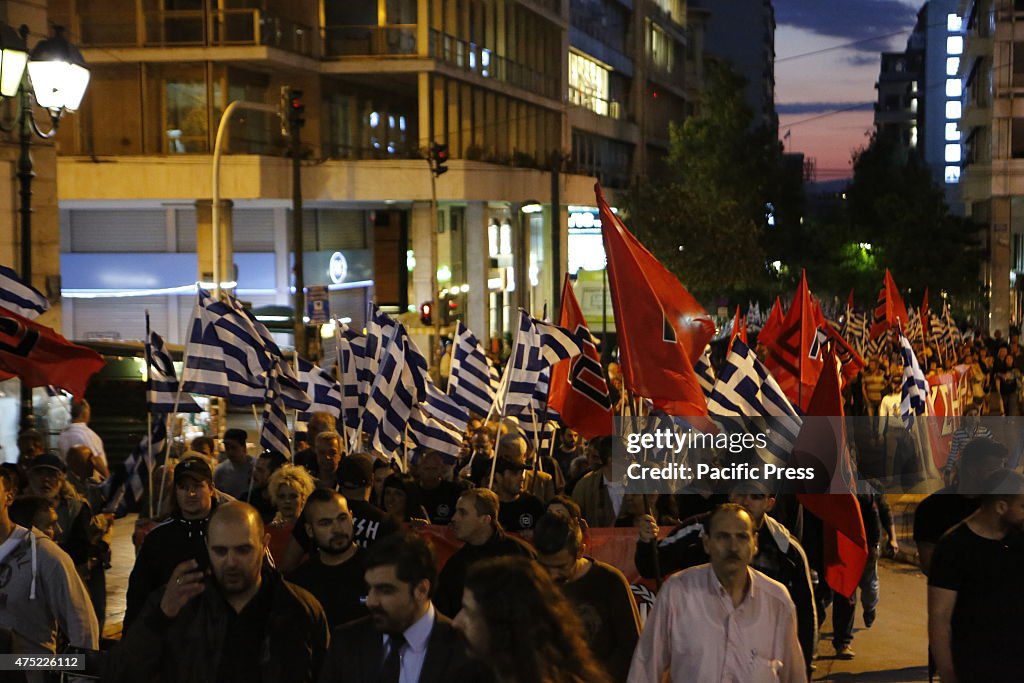 The Golden Dawn rally marches to the Greek Parliament. Right...